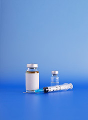 Syringe and two glass vials