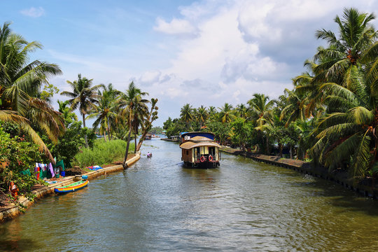 Boathouse sailing in the backwaters in Allepey, Kerala, India.