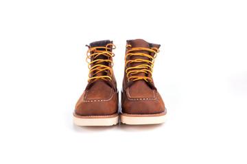Brown boot on white background.