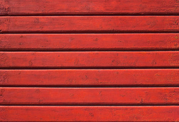 Red wooden wall.