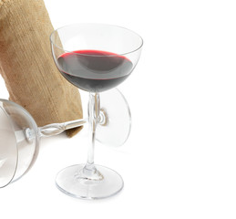 Glass of red wine isolated on a white. Free space for text.