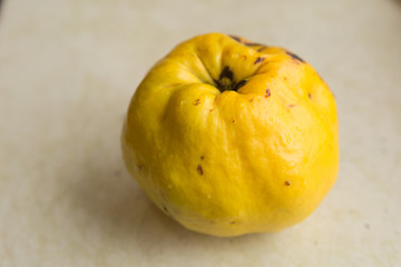fresh yellow quince with slice isolated white background . Quince on a white background .