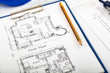 Blueprint and a pencil, engineering concept