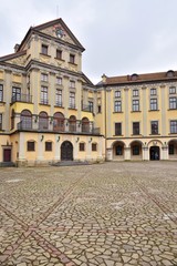Obraz premium Nesvizh, Belarus - March 2020. Beautiful medieval Nesvizh castle. Famous landmark in Belarus residential castle. Medieval castle complex Niasvizh. UNESCO heritage. Castle courtyard