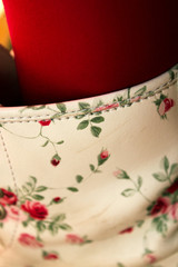 a bright leg element with colored pink tights and a stylish floral boot