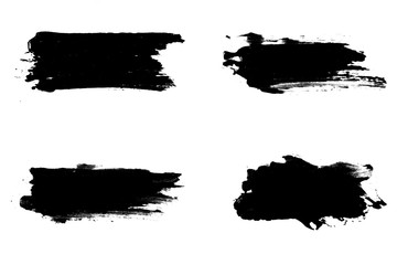 set four black strokes of paint isolated on a white background.