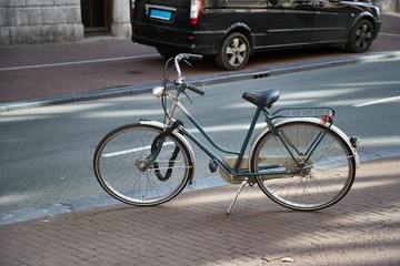 Fototapeta na wymiar Bicycle on a bright sunny day