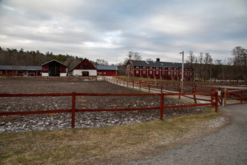 
Horse stables and corrals under the evening sky