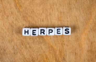 Fototapeta premium cube words on the wooden table