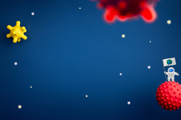 blue background with astronaut, stars and rocket