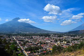 Fototapeta na wymiar Bird View of Antigua Guatemala with Volcanoes nearby