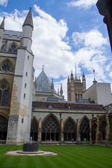 Inner garden of Westminster Abbey, with view of many points of its upper part, London, UK.