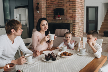 Family in a big house. Lifestyle Home comfort. Children at home.