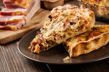 Pieces of quiche lorraine with bacon and cheese
