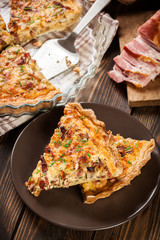 Pieces of quiche lorraine with bacon and cheese