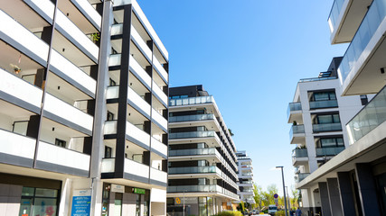 Warsaw, Poland - April 27, 2020: modern apartment buildings in the city. Front view of a modern...
