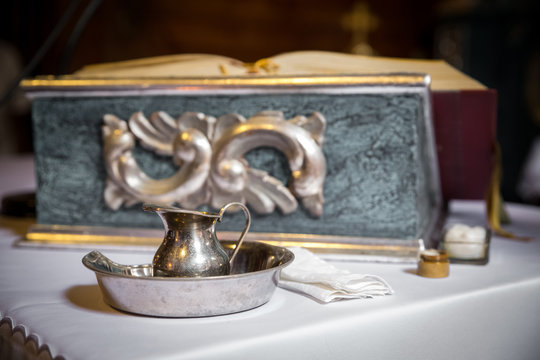 A small baptismal font on the church's altar