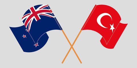 Obraz premium Crossed and waving flags of New Zealand and Turkey