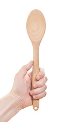Hand with wooden spoon isolated on white background