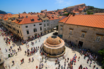 Large Onofrio's Fountain inside Dubrovnik's walled city in Croatia, just after the Pile Gate on the Stradun - Stone medieval buildings and famous tourist destination