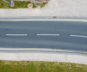 An empty highway road from above, empty due to the coronavirus lockdown during the corona virus covid 19 epidemic pandemic. Empty public spaces enforced by the government.