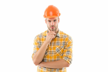 Creativity and practice. Confident strict guy. Keep head safe in helmet. Improvement and renovation. Man builder or inspector. Engineer architect builder. Man builder hard hat. Handyman at workshop