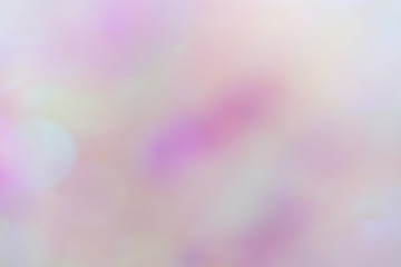 Abstract blurred rainbow glitter background. Bright and colorful background.