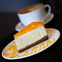 Photo macro of a delicious orange cheesecake