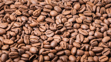 medium roast whole coffee beans background