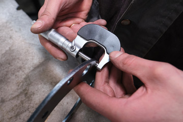 The process of measuring the ring of a large diesel engine in a machine-building plant