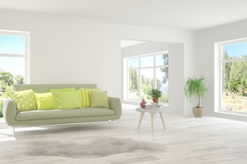 White living room with sofa and summer landscape in window. Scandinavian interior design. 3D illustration