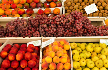 Fruits on the famous market in Funchal, Madeira Island, Portugal. Exotic fruit. Banana, mango, passion fruit or avocado. Colorful food, healthy lifestyle
