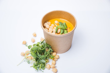 broccoli spinach cream soup on rustic wooden background