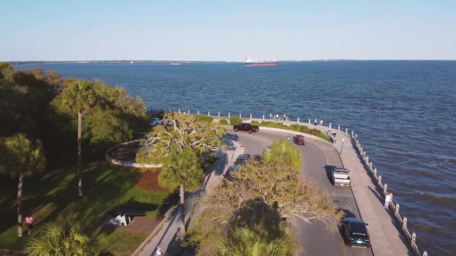 4k Aerial of Charleston South Carolina at Sunrise. Aerial flying over city of in the morning. Urban historic costal town at sunrise. Luxury wealthy town. City of churches. perspective of downtown