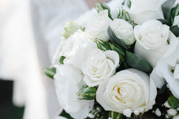 bride's bouquet of white roses