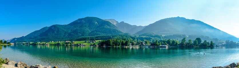 Fototapeta premium Panorama view on Wolfgangsee Lake with alp mountain Schafberg. Salzkammergut, Austria