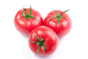 Red fresh tomatoes isolated on white background in close-up