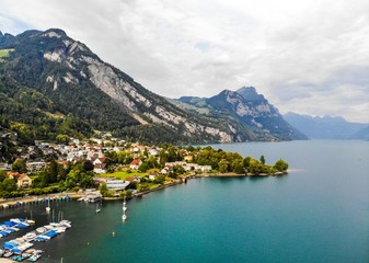 Fototapeta na wymiar Aerial view on Walensee (Lake Walen) in Weesen, nearby Beltis, Amden. Canton St. Galen, Glarus, Switzerland