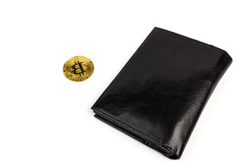 Gold bitcoin with  black wallet. Business, money, cryptocurrency concept.