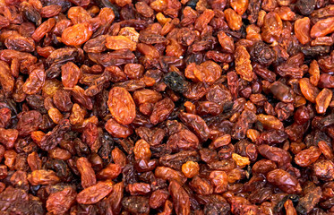 Sweet dry raisins close-up shot for background . Many Raisins for background grape raisin texture 