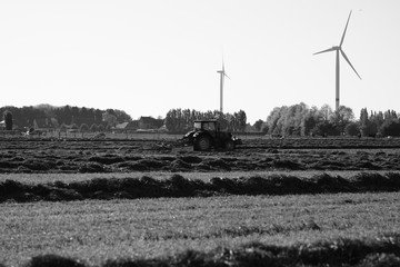 mowing grass on the field