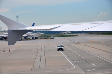 Runaway at the airport with wing and staff car, Houston, Texas