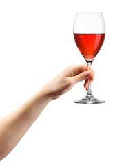Woman hand holding red wine glass isolated on white.