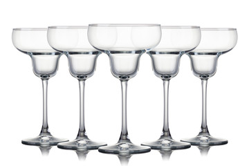 Set of empty Margarita cocktail glasses isolated on a white background