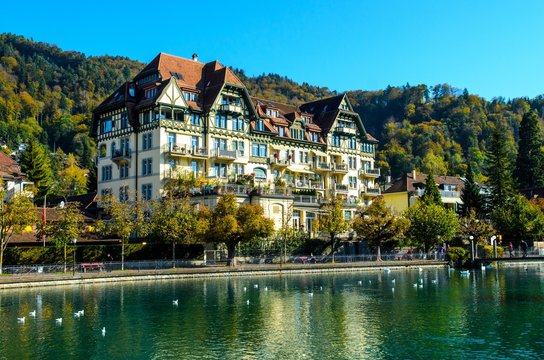 City view of Thun, with old and historical houses next to river Aare. Canton Bern, Switzerland