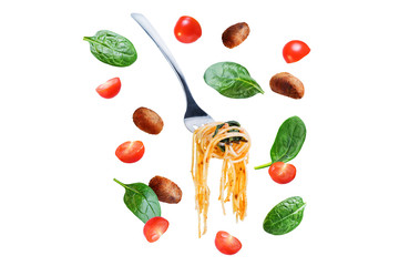 Tomato Spinach Sausage Pasta in a white plate on a white isolated background