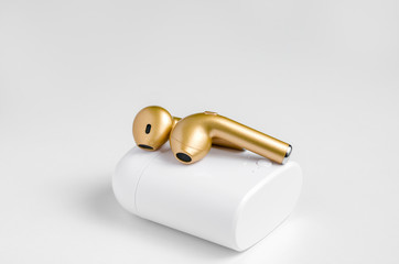 Golden bluetooth  headphones  for  sale  at store  . New generation of true wireless earbuds .