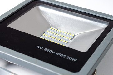 Close-up  of  aluminum 20 watt solar led diode   light luminary new  generation   on white background