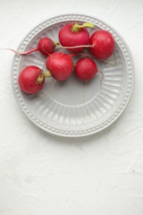 radish on a plate, red vegetable
