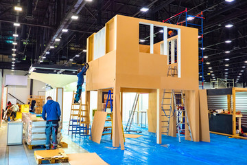 Installation of a plywood frame. Preparation for the construction exhibition. Installation of the...